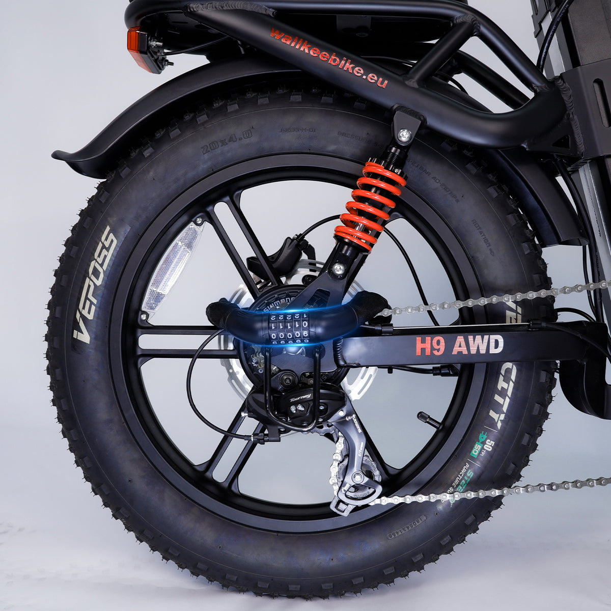 Fat tire e-bike rear wheel with anti-theft password chain lock, offering safety for tough roads and mountain trails.